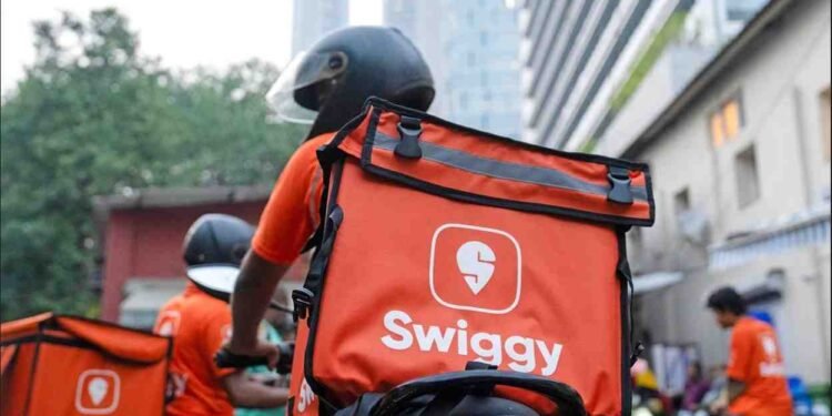 Swiggy Shareholders Beware: 13 May Could Reshape Your Profit Calculations 1 Swiggy Share Price, Swiggy IPO Lock-in, Indian Stock Market, Stock Market Volatility, Food Delivery Stocks, Share Market News India, Swiggy Shareholders, Pre-IPO Shares Lock-in Expiry, May 13 Stock Market Event, Swiggy Stock Forecast, Brokerage Report Swiggy, JM Financial Swiggy, Macquarie Swiggy, Swiggy Share Sell-off Risk, Foreign Investors Swiggy, Zomato vs Swiggy, Swiggy share price prediction May 2025, Impact of Swiggy pre-IPO lock-in expiry on stock price, Will Swiggy share price fall on May 13?, Brokerage warnings on Swiggy stock, Major investors selling Swiggy shares, Swiggy vs Zomato stock comparison, Volatility expected in Swiggy stock after lock-in expiry, Lock-in expiry for Swiggy shares: what investors should know, Swiggy InstaMart concerns impacting stock, Pre-IPO investors profit taking in Swiggy,
